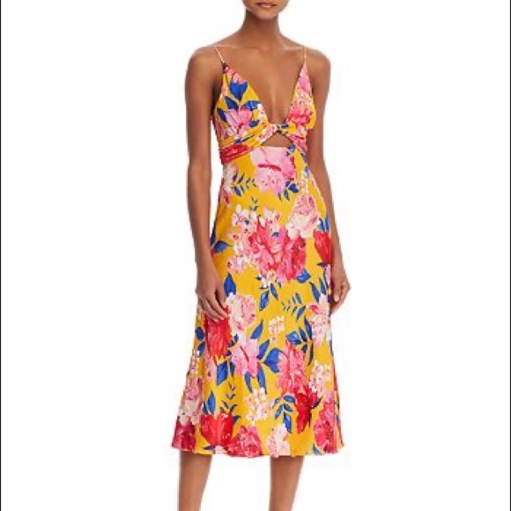 Vibrant floral dress perfect for tropical wedding. Great condition